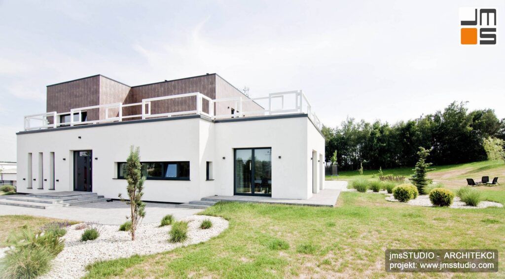 Architekt Kraków projekt dużego nowoczesnego prostego domu z pudełek brył prostych z płaskim dachem i tarasem okolice Poznania