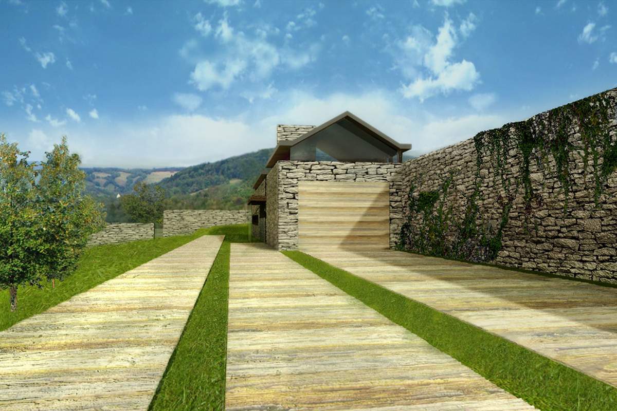 Widok na garaż dwustanowiskowy i wejście techniczne domu jednorodzinnego.